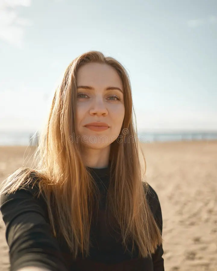 files/beautiful-woman-long-hair-blonde-taking-selfie-mobile-phone-sandy-beach-summer-autumn-pretty-female-looking-198578617.webp